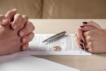 THE BUSINESS OF DIVORCE
